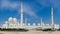 White Grand Mosque against blue sky, also called Sheikh Zayed BinSultan Nahyan Mosque, inspired by Persian, Mughal and Moorish