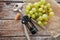 White grape harvest wine corkscrew stopper