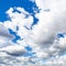 White and gray cumulus clouds in sky in september