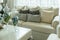 White and gray decorative pillows on sofa in the living room