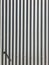 White gray painted corrugated zinc metallic sheet board fence texture pattern on house wall surface background. Detail backdrop