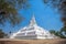 The white great chedi Phu Khao Thong in blue sky