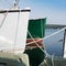 White and green boats in marina harbor