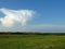 White and grey clouds in blue sky. Stormy rainy weather forecast