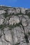 White and grey extremely steep granite rock walls of Lysefjord fjord and canyon in Norway