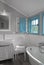 White grey rustic bathroom with window