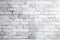 White grunge brick wall texture background, versatile background that can be used for various projects. Texture for traditional