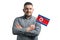 White guy holding a flag of North Korea smiling confident with crossed arms isolated on a white background