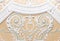 White gypsum bas-relief design details with floral pattern