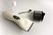 White hair clipper with attachment, oil and cleaning brush on white isolate