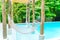 White hammocks in Luxury swimming pool .