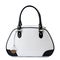 White handbag with black handles isolated on white background.