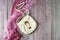 White handbag on a wooden background