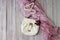 White handbag on a wooden background