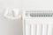 White heating radiator in an apartment. Detail shot