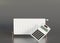 White heating radiator and calculator on gray background. Central heating system. Free, copy space for your text