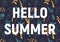 White hello summer letters on dark purple, cyan and yellow floral leaves background. Beautiful seasonal night, evening