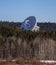 White hemisphere of the radar radio telescope antenna with diameter of the main mirror of 32 m