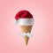 White hipster mustache and hat of Santa Claus with ice cream cone on pink background. New Year or Christmas minimal concept