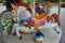 White horses on children`s carousel, close up