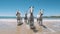 White horses running on the sandy beach by the sea in summer