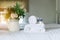 White hotel towel on bed,Stack of fluffy bath towels