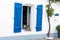 White house facade with blue shutter in Noirmoutier island vendee France
