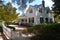 White House with Picket Fence in a Quaint American Town