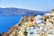 White houses with blue roofs on Santorini