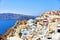 White houses with blue roofs on Santorini