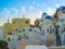 White houses, churches and blue domes in Oia village