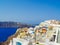 White houses, churches and blue domes in Oia village