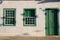 White houses with colored doors and windows in Paraty