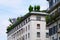 White houses with green roofs of Milan