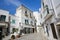 White houses in a street in Ostuni, Puglia, Italy