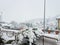 White houses and trees - village Milanovac under snow. Winter in Croatia