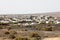 White houses of Yaiza town from Las Colorads beach, Lanzarote, Canary Islands