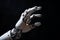 White humanoid cyborg pointing with finger on black background. Abstract robot, AI concept. AI generated