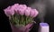 White humidifier with spring flowers on a black background