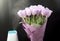 White humidifier with spring flowers on a black background.