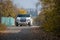 White Hummer H2 limousine at the rural street