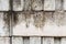 White Interlocking brick wall dirty rough mortar