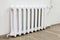 White iron radiator central heating is in room