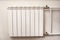 White iron radiator central heating in room