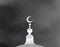 White islamic symbol on mosqueâ€™s cupola