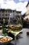 White italian wine on a wineglass on an outdoor restaurant