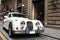 White Jaguar retro car on the streets of Italy