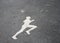The white jogging man painting on the jogging lane. run at a steady gentle pace.
