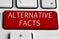 White keyboard with Alternative facts button