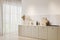 White kitchen corner with beige cabinets